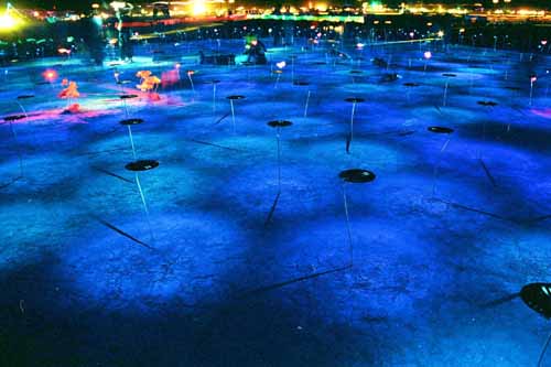 Closer view of blue lighted desert area